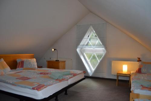 Ein Bett oder Betten in einem Zimmer der Unterkunft Apartmány Holiday Pec