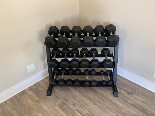 a black rack of dumbbells in a room at Bayside Inn Key Largo in Key Largo