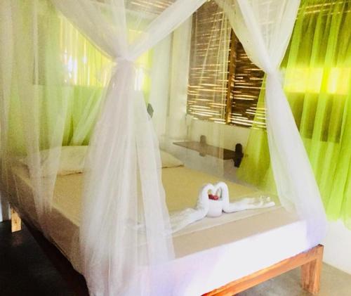 Ecohotel Kocoluuにあるベッド