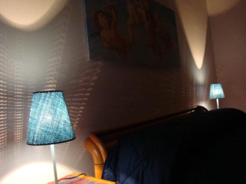Postel nebo postele na pokoji v ubytování B&B Terra Niura
