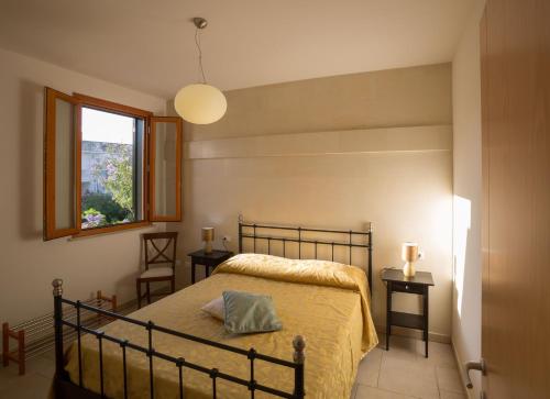 Llit o llits en una habitació de Casina dei Nonni