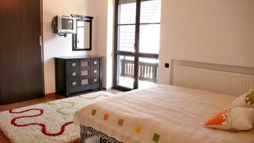 Кровать или кровати в номере Complex Vile- Milana M Residence