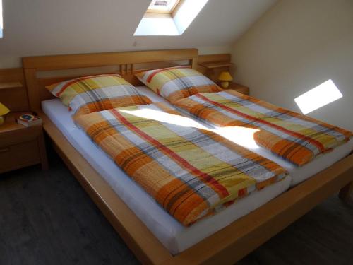 Ένα ή περισσότερα κρεβάτια σε δωμάτιο στο 50101 Sonnenwind 1