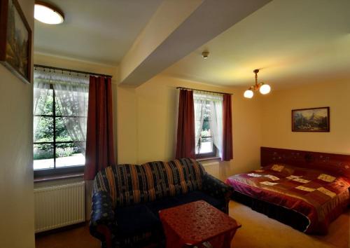 Un ou plusieurs lits dans un hébergement de l'établissement Willa Zarębek