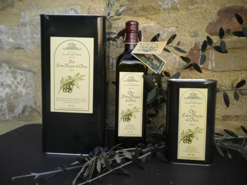 two bottles of wine sitting on a table at Locanda dell'Angelo in Palazzo