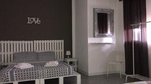 Ένα ή περισσότερα κρεβάτια σε δωμάτιο στο Comeacasatua