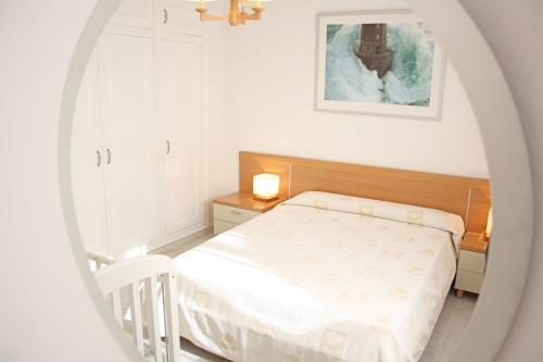 Posteľ alebo postele v izbe v ubytovaní Playazul seafront apartament
