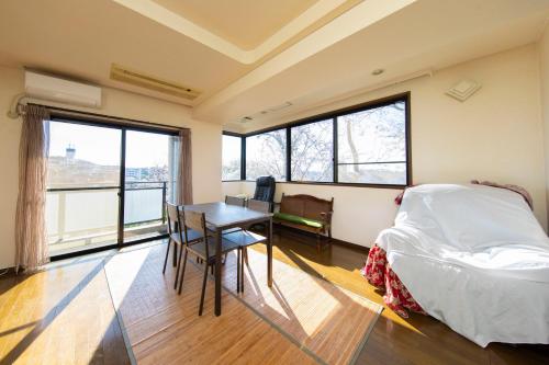 Katil atau katil-katil dalam bilik di 平楽園弐番館２階