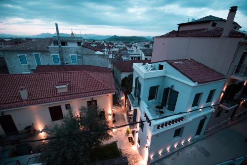 an overhead view of a city at night with buildings at Pension Dafni in Nafplio