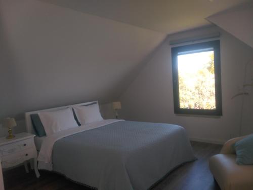 Ένα ή περισσότερα κρεβάτια σε δωμάτιο στο Quinta do Senhor