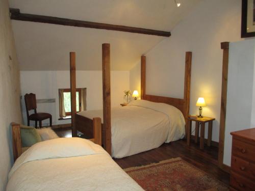 Postel nebo postele na pokoji v ubytování Chez Tartaud