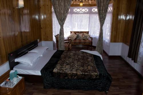 Postel nebo postele na pokoji v ubytování Yashita Homestay