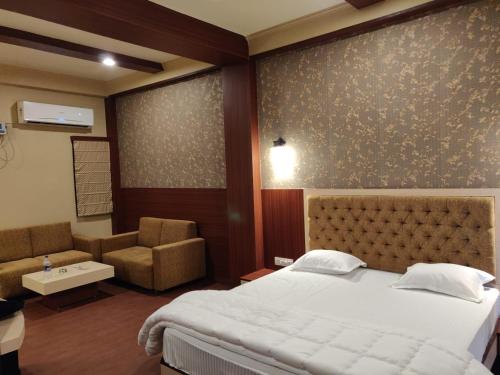 Ένα ή περισσότερα κρεβάτια σε δωμάτιο στο Backpackers Park Varanasi