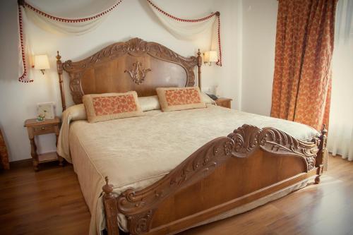 Кровать или кровати в номере Palacio Azcárate Hotel