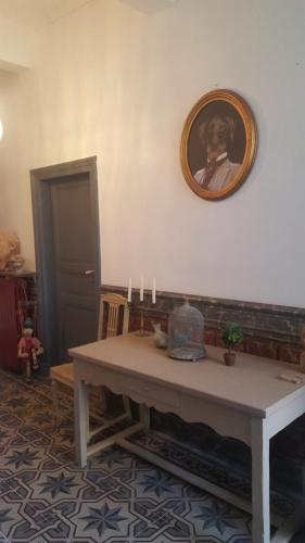 a room with a table with candles and a picture on the wall at La Belle Vie B&B in Montréal