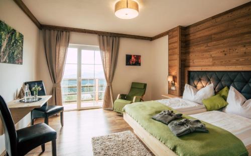 Postel nebo postele na pokoji v ubytování Hotel Schwengerer