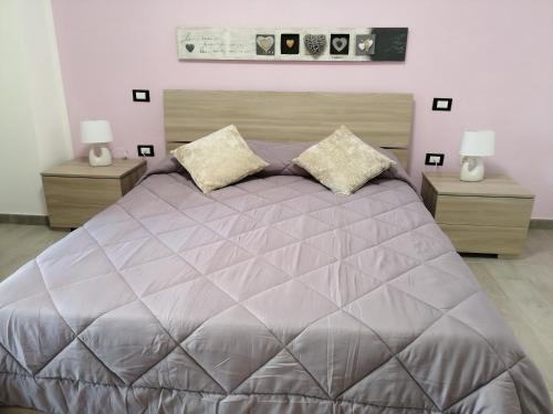 Postel nebo postele na pokoji v ubytování Alba Casa Vacanze - Lerici, 5 Terre