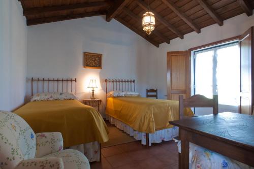 Giường trong phòng chung tại Quinta do lagar