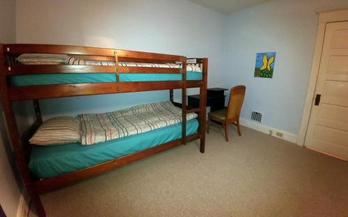 Poschodová posteľ alebo postele v izbe v ubytovaní Boulevard Park Apartments