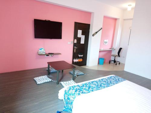 TV a/nebo společenská místnost v ubytování New Summer Homestay
