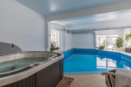 Φωτογραφία από το άλμπουμ του Rezydencja Marjo z basenem σε Kościelisko