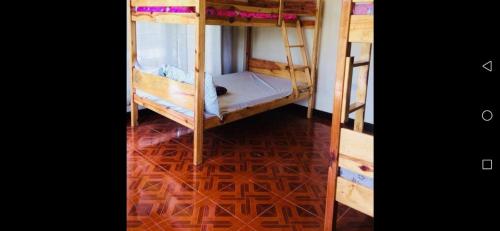 Кровать или кровати в номере Banga-an BnB and Coffee House