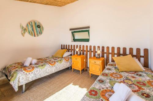 Postel nebo postele na pokoji v ubytování Villa Rita