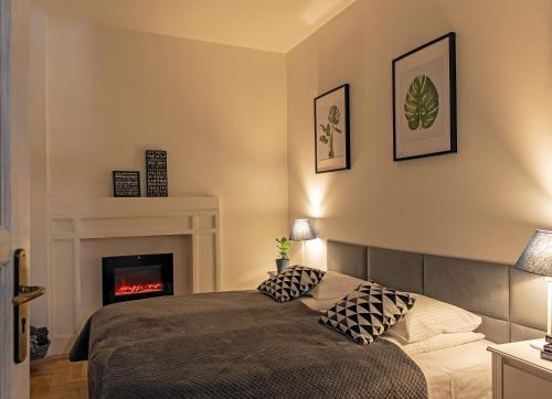 Posteľ alebo postele v izbe v ubytovaní 3D FLORIANSKA 15 Apartament