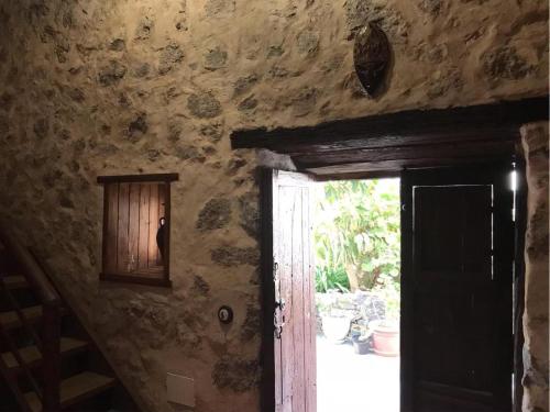 an open door to a room with a stairway at Casa Princess Arminda in Betancuría