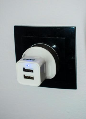 a toaster is attached to a black holder at Villa-Maria in Triopetra