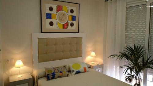 Postel nebo postele na pokoji v ubytování Apartamento el Torreón