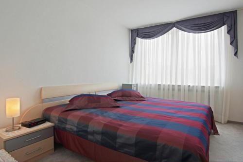 Postel nebo postele na pokoji v ubytování Private Apartment