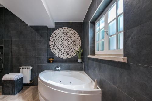 Kúpeľňa v ubytovaní 19 Tile Ceramic Concept - by Unlock Hotels