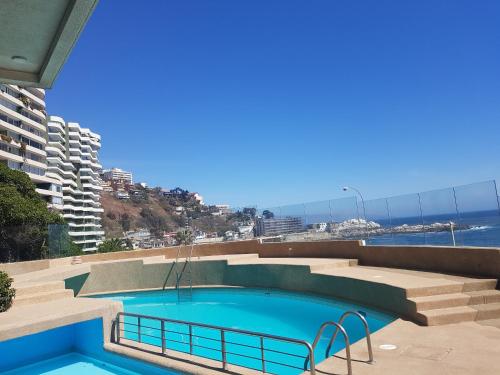 Piscina a Departamento Reñaca o a prop