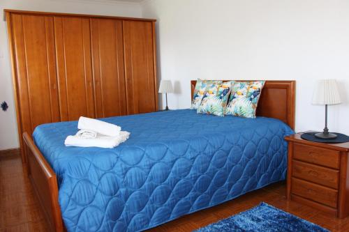A bed or beds in a room at Casa do Facho