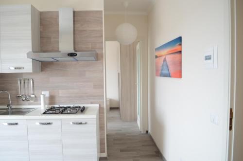 Kuchyň nebo kuchyňský kout v ubytování Suite Alba - charme e relax con luce del mattino