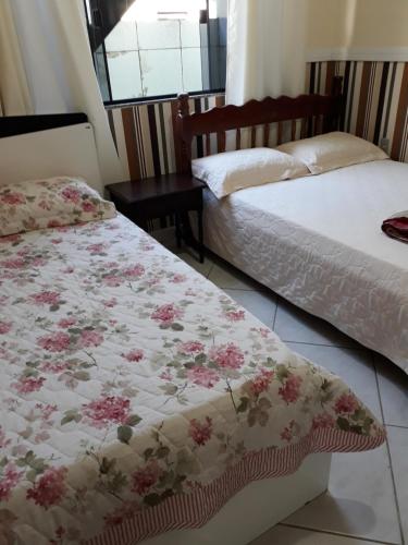 Säng eller sängar i ett rum på Casa praia