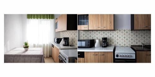 a kitchen with wooden cabinets and a stove top oven at Apartament Anita in Vulcan