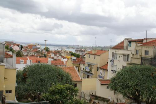 a view of a city with buildings and trees at Casa da Marcos de Portugal in Lisbon