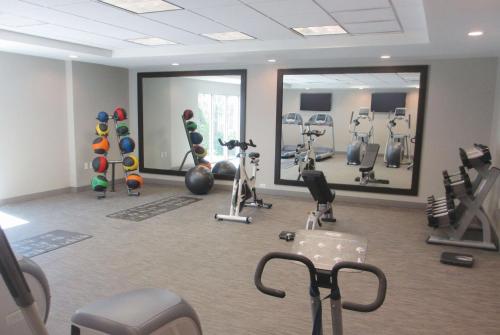 a gym with many exercise equipment in a room at La Quinta by Wyndham Orem University Pwy Provo in Orem
