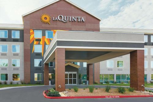 a hospital building with a sign on the front of it at La Quinta by Wyndham Austin Round Rock in Round Rock