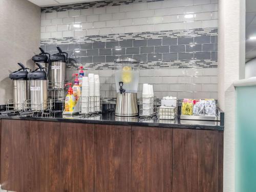 a counter in a kitchen with a bunch of appliances at La Quinta by Wyndham Myrtle Beach - N. Kings Hwy in Myrtle Beach