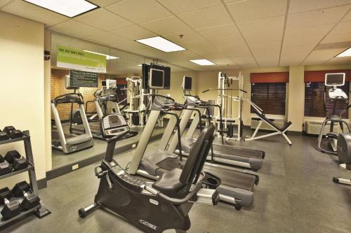 a gym with several treadmills and cardio machines at La Quinta by Wyndham Elkview - Charleston NE in Elkview