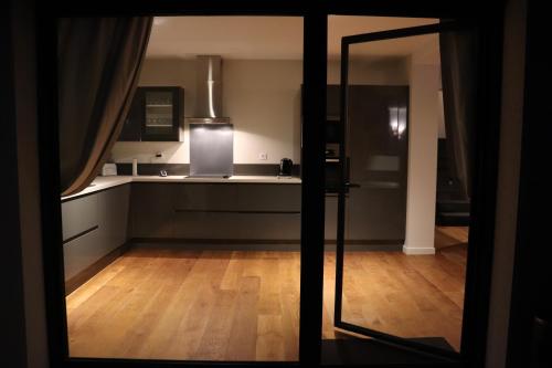 Ένα ή περισσότερα κρεβάτια σε δωμάτιο στο Le Boudoir