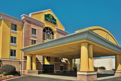 a hotel with a gazebo in front of a building at La Quinta by Wyndham Hot Springs in Hot Springs