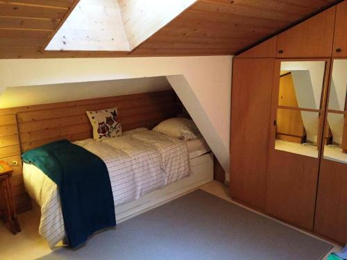 Ein Bett oder Betten in einem Zimmer der Unterkunft Apartment Cristina - Südbalkon mit Bergblick