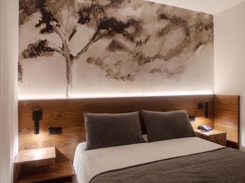 Postel nebo postele na pokoji v ubytování Hotel Afonso V & SPA