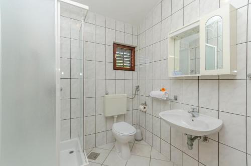Kúpeľňa v ubytovaní Apartments Sklopina