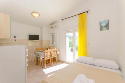 Posteľ alebo postele v izbe v ubytovaní Apartments Sklopina