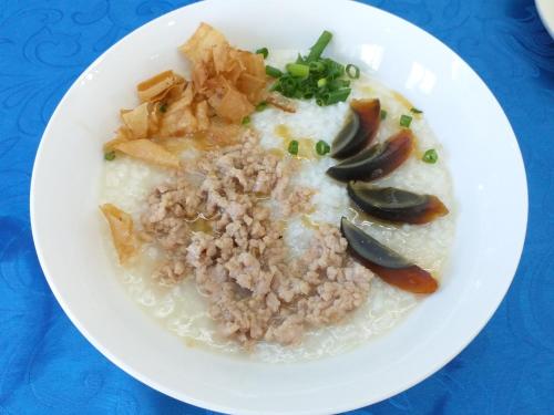 a white plate of food with rice and vegetables at Grand Blue Beach Hotel in Boracay